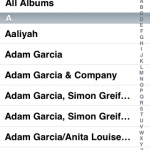 選擇iTunes歌曲資料庫的話，便會進入另一畫面，裡面的以大碟名稱及演出者等列出歌曲內容，其介面跟iPod有點相近，點選後便可即時播放。